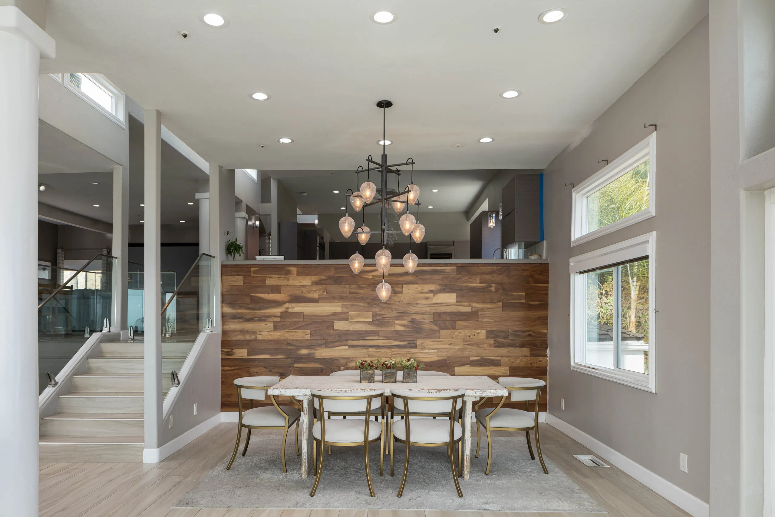 Dining room against a wood feature wall