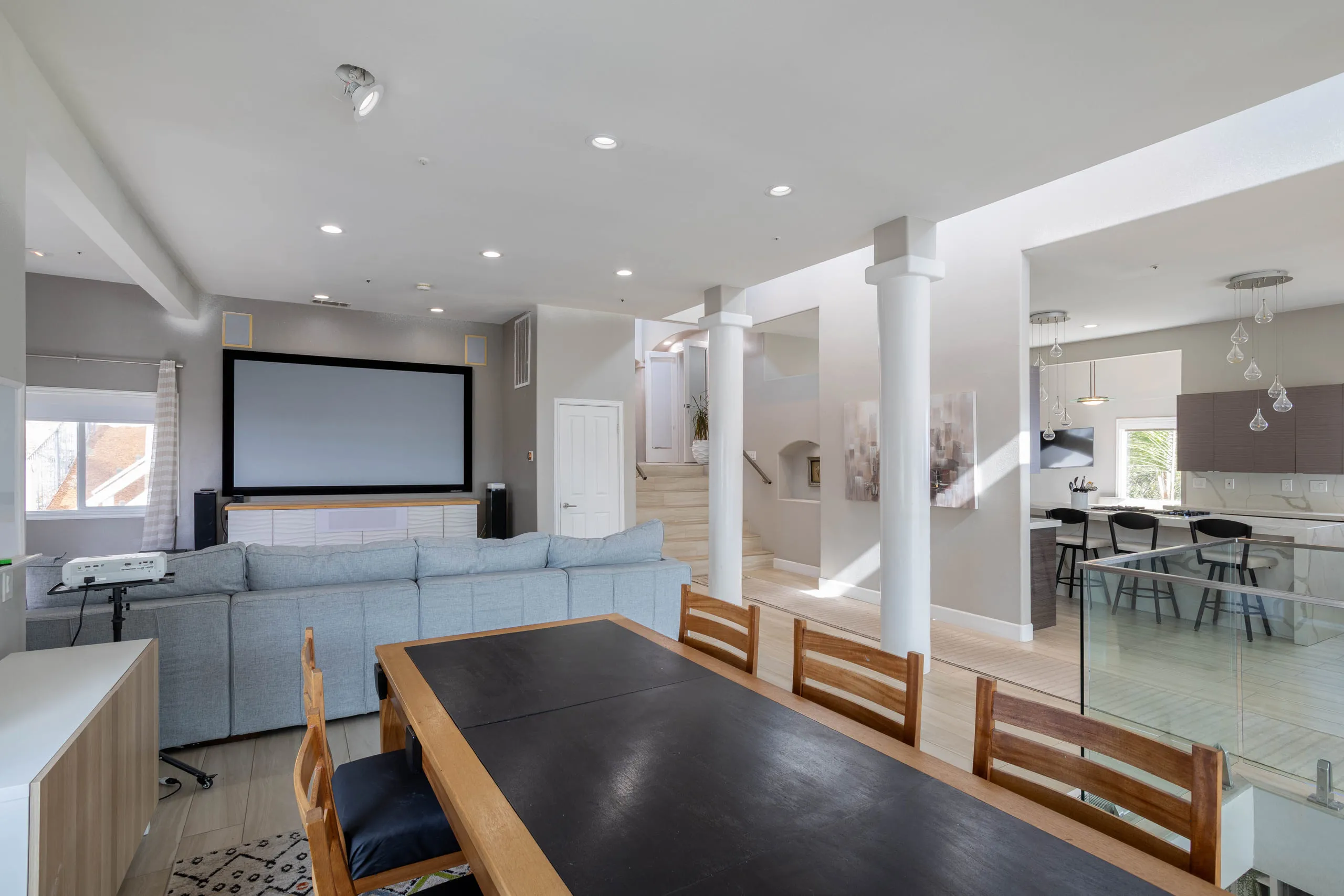 Game room and long table, open to the kitchen