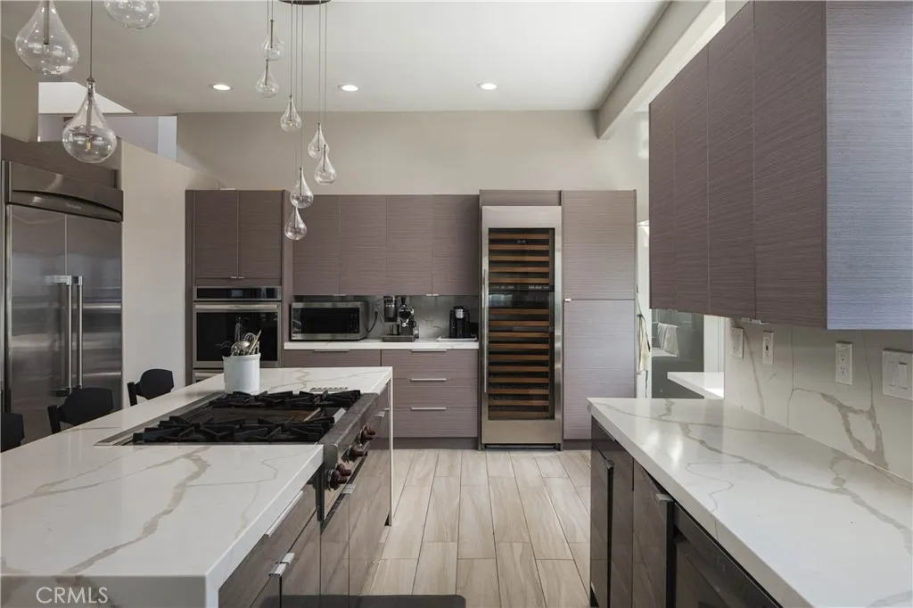 Marble island, professional range, and wine column