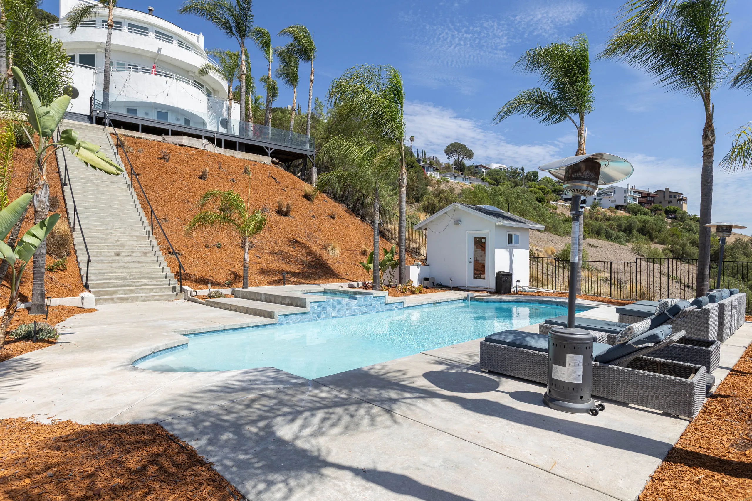 Pool terrace and spa on the hillside